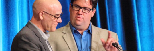 Community building at its best The Ven. PJ Hobbs (L) and the Rev. Joel Crouse (R) lead a community building exercise the first day of Joint Assembly. Photo by Art Babych/Anglican Journal